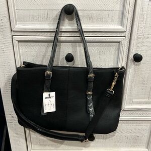 Black work bag. Can hold a laptop. Zipper middle pocket and snap enclosure.